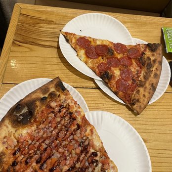 Benny Cavalloni's - two slices of pizza on paper plates - Pizza Near Me - Virginia Beach, Virginia Benny Cavalloni's - two slices of pizza on paper plates - Pizza Near Me - Virginia Beach, Virginia