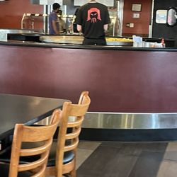 HuHot Mongolian Grill - This is the kind worker who was super cute and nice and deserves a raise