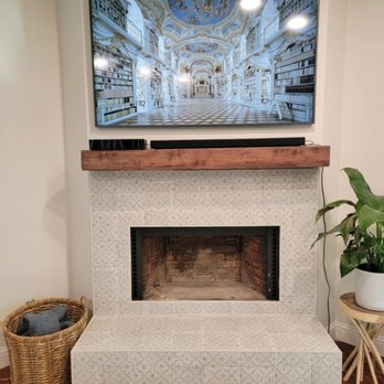 Handyman and Sam - Fireplace retiling and mantle - General Contractors Near Me