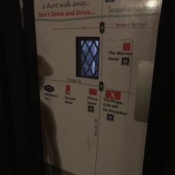 The Blogg Pub & Grill - The inside of the exit door... a map that shows you were all the hotels are and reminds you not to drink and drive! Super smart!