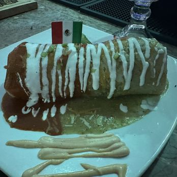 La Casa De Las Flores - El Mamalon Burrito with Red and Green Sauce - Mexican Near Me - Mesa, Arizona La Casa De Las Flores - El Mamalon Burrito with Red and Green Sauce - Mexican Near Me - Mesa, Arizona