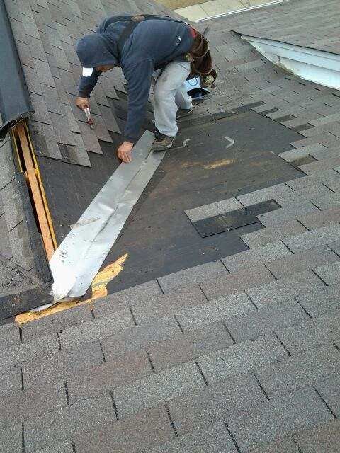 Slide of Lowe-Boykin Roof & Gutter