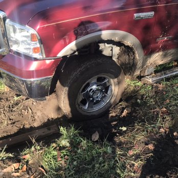 Rapid Roadside Runner - Winch, stuck in mud - Towing Near Me - Seattle, Washington