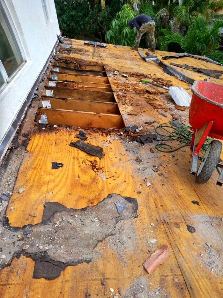 Slide of Carlos Roofing