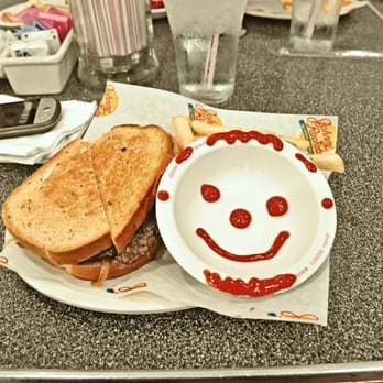 Johnny Rockets - a sandwich with a smiley face painted on it - Burgers Near Me - Braintree, Massachusetts Johnny Rockets - a sandwich with a smiley face painted on it - Burgers Near Me - Braintree, Massachusetts