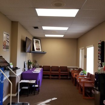 Paladin Chiropractic - Wide angle shot of the reception room. Also pictured is our check-in kiosk and Foot Levelers scanner. - Chiropractors Near Me - Winter Park, Florida