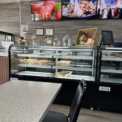 Bagel Time & Bakery Cafe - Their front case and video screens