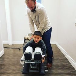 True Health Wellness Centers - Dr Russ keeping kids aligned and well