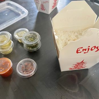 D E Thai Kitchen - Downtown - Spicy sauces and extras. To-go white Jasmine Rice - Thai Near Me - Las Vegas, Nevada D E Thai Kitchen - Downtown - Spicy sauces and extras. To-go white Jasmine Rice - Thai Near Me - Las Vegas, Nevada