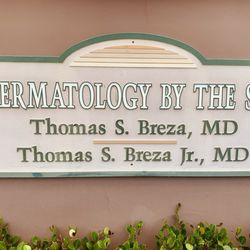 Dermatology By the Sea - Business sign on bldg.
