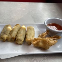 Samurai Express Japanese Steakhouse - Spring rolls -- and the only crab Rangoon left! (It didn't make it to the takeout box...)