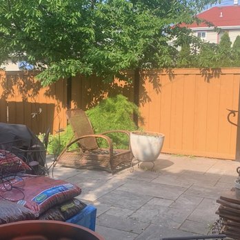 Freddy Painting - Cedar fence after stain and weatherproofing - Painters Near Me