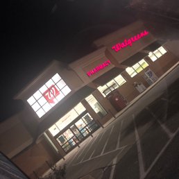 the front of a store at night