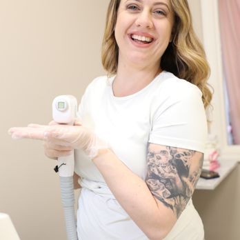 Long Island Esthetics - Owner Andrea with the laser hair removal machine - Hair Removal Near Me - Massapequa, New York Long Island Esthetics - Owner Andrea with the laser hair removal machine - Hair Removal Near Me - Massapequa, New York