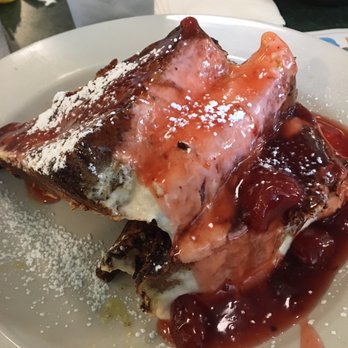 Metro Diner - Cheesecake stuffed Challah with strawberries - Breakfast & Brunch Near Me - Palm Coast, Florida Metro Diner - Cheesecake stuffed Challah with strawberries - Breakfast & Brunch Near Me - Palm Coast, Florida