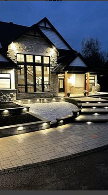 Outdoor Ambiance: Landscaping with Lights - Experience the transformative power of lighting in outdoor design. This portfolio highlights our best home landscape projects where innovative lighting brings gardens, pathways, and patios to life after dark. Each space combines beautiful plantings with strategically placed lights to enhance safety, create ambiance, and showcase architectural features. Discover how we blend creativity and technology to craft inviting, elegant exteriors that shine both day and night. Outdoor Ambiance: Landscaping with Lights - Experience the transformative power of lighting in outdoor design. This portfolio highlights our best home landscape projects where innovative lighting brings gardens, pathways, and patios to life after dark. Each space combines beautiful plantings with strategically placed lights to enhance safety, create ambiance, and showcase architectural features. Discover how we blend creativity and technology to craft inviting, elegant exteriors that shine both day and night.