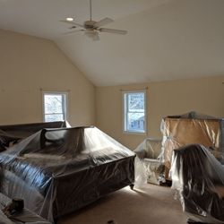 Quality Painting - Before picture. Large bedroom. Customer wanted to paint ceiling color down on walls as well to make room seem smaller