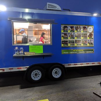 JoyFul Catering - a blue food truck parked in a parking lot - Filipino Near Me JoyFul Catering - a blue food truck parked in a parking lot - Filipino Near Me