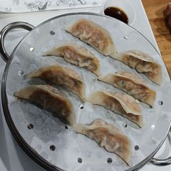 Pork, Kimchi, Tofu, and vegetables steamed dumplings