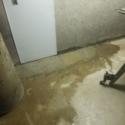 Utech Basement Waterproofing - 2nd time they came out. Water was pouring out of the bottom and covered the left side of my basement into my laundry room.