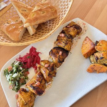Zarak By Afghan Kitchen - Sesame Naan + Chicken Kebab - Afghan Near Me - Vancouver, British Columbia Zarak By Afghan Kitchen - Sesame Naan + Chicken Kebab - Afghan Near Me - Vancouver, British Columbia