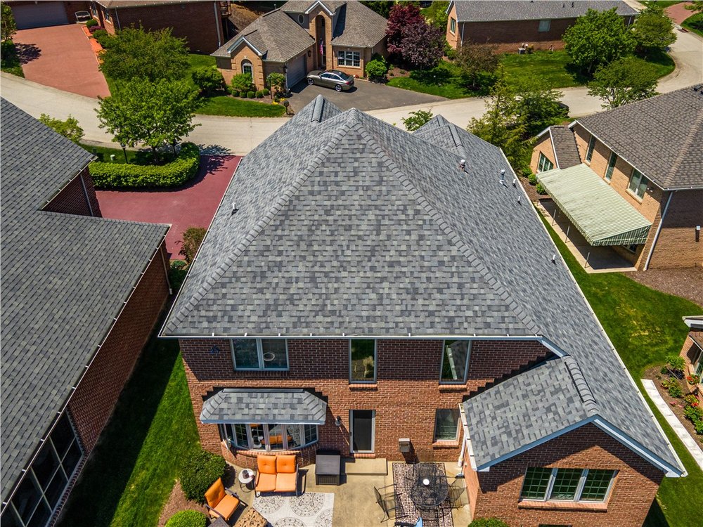 Slide of Buccos Roofing