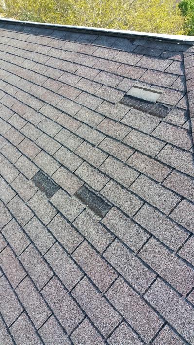 Slide of Port City Roofing