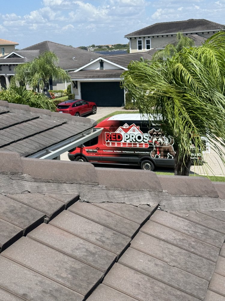 Slide of Red Pros Roofing