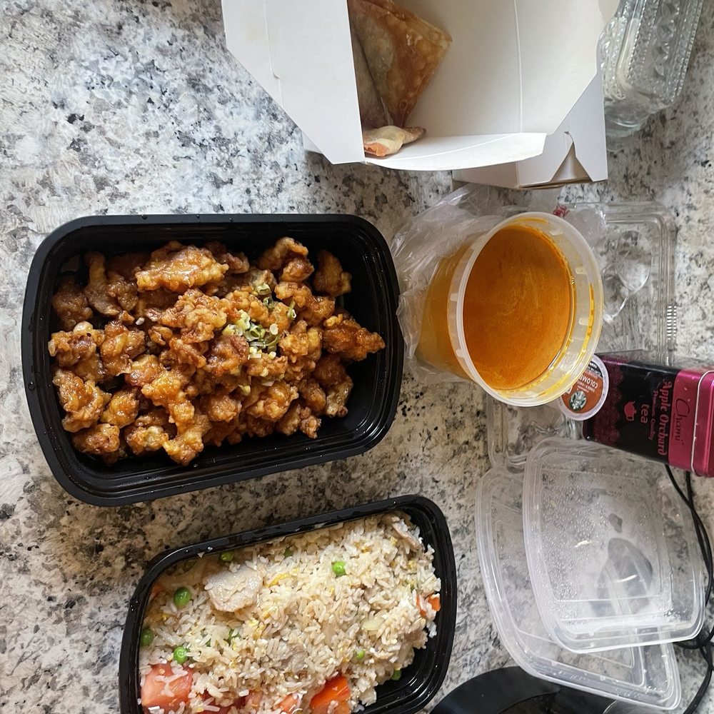 Orchid pork Thai rice, Orange Chicken, Yellow Curry and Wontons Orchid pork Thai rice, Orange Chicken, Yellow Curry and Wontons