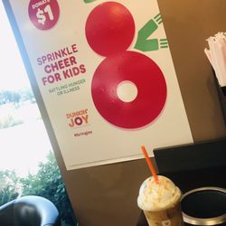 Dunkin' - Medium iced white chocolate coffee with whip cream which is the best part.