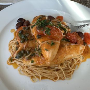 The Grille  - Cobian fish angel hair pasta white wine sauce with olives and capers - Italian Near Me - New Smyrna Beach, Florida