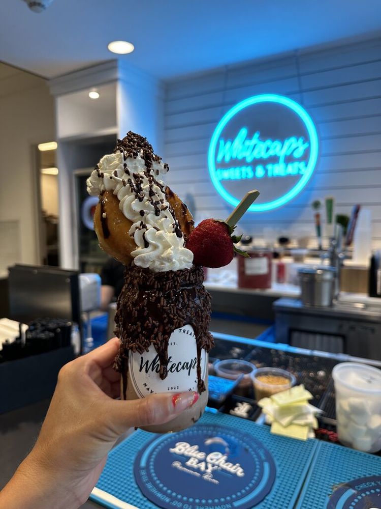 Whitecaps Sweets & Treats Logo