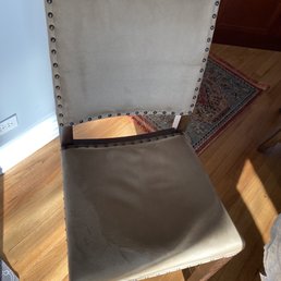 Sunken padding on a chair that was only used about 5 times. You can't even sit comfortably in this chair!