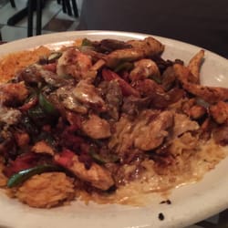 Tequila Mexican Restaurant - Paella grilled chicken , steak and shrimp with grilled veggies and rice. Delicious! Huge serving!