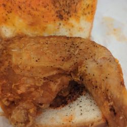Chicken leg sandwich with salt, pepper and got sauce
