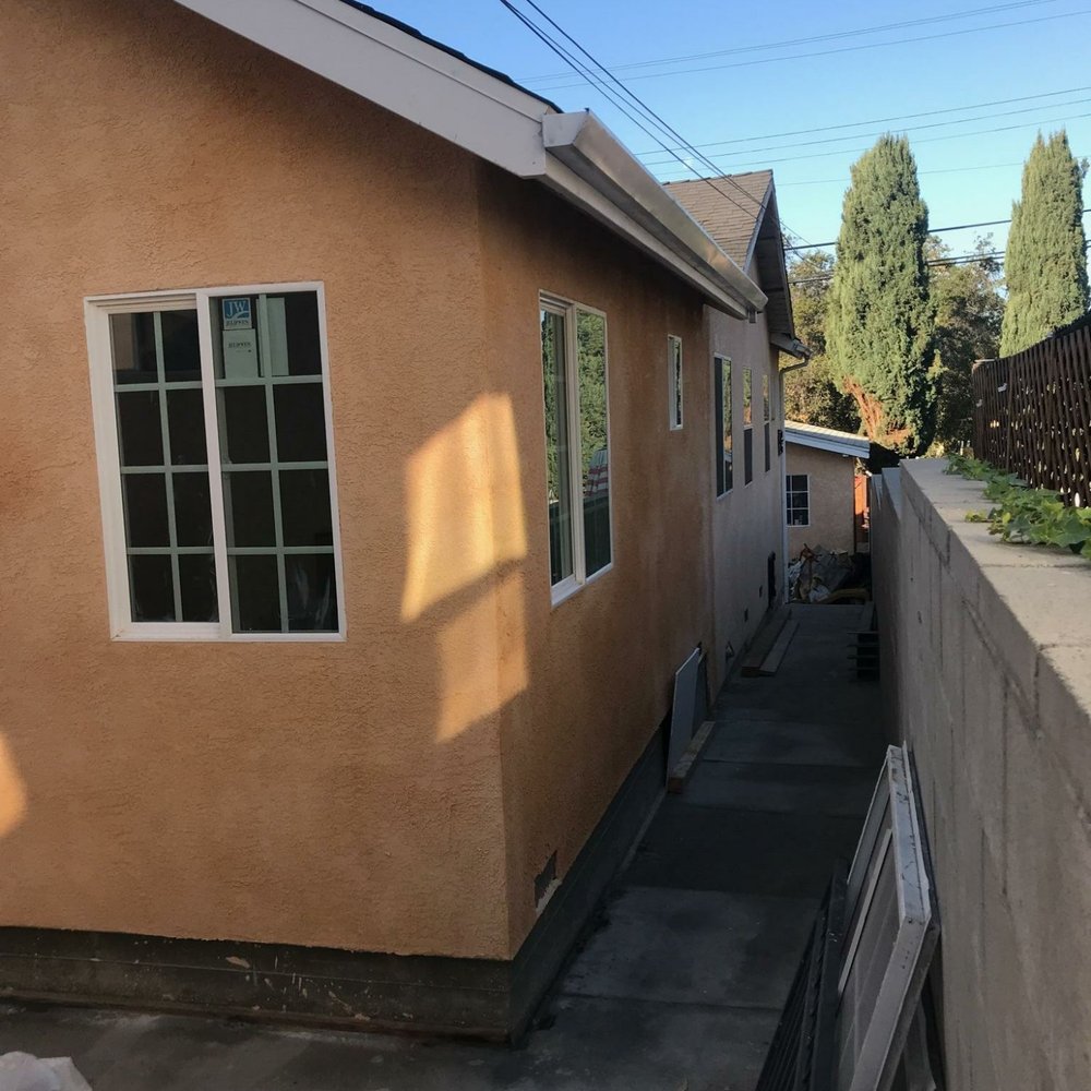 Genesis Custom Construction - a view of the back of a house - General Contractors Near Me - Los Angeles, California Genesis Custom Construction - a view of the back of a house - General Contractors Near Me - Los Angeles, California