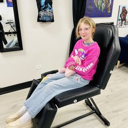 New Hope Tattoo - Getting ready to get our ears pierced!