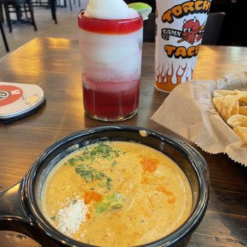 Torchy's Tacos - Sangria swirl, cheese dip. - Tex-Mex Near Me - Fishers, Indiana Torchy's Tacos - Sangria swirl, cheese dip. - Tex-Mex Near Me - Fishers, Indiana