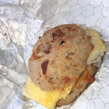 Great Harvest Bread - Egg and cheese on biscuit, clearly there are bacon bits in the biscuit - Sandwiches Near Me - Loganville, Georgia Great Harvest Bread - Egg and cheese on biscuit, clearly there are bacon bits in the biscuit - Sandwiches Near Me - Loganville, Georgia