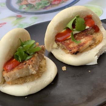 Wagamama - Pulled pork with panko apple, in a steamed bun - Asian Fusion Near Me - London, XGL Wagamama - Pulled pork with panko apple, in a steamed bun - Asian Fusion Near Me - London, XGL