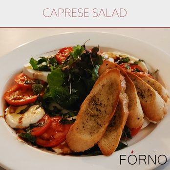 Forno - a plate of food with bread and vegetables - Pizza Near Me - Red Deer, Alberta Forno - a plate of food with bread and vegetables - Pizza Near Me - Red Deer, Alberta