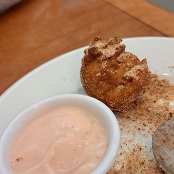 Peach Valley Café - Apple fritter homemade Yogurt dipping sauce - Breakfast & Brunch Near Me - Mount Dora, Florida Peach Valley Café - Apple fritter homemade Yogurt dipping sauce - Breakfast & Brunch Near Me - Mount Dora, Florida