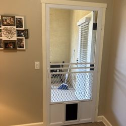 Mobile Screen Repair - We just completed a swinging screen door with integrated dog door installation. Give us a call for a free quote.