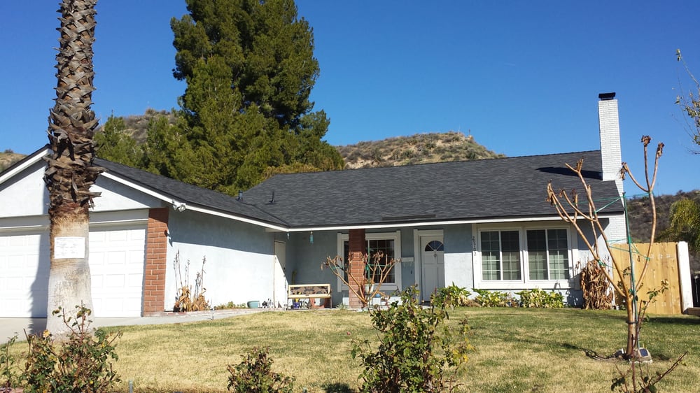 Slide of A. L. Follett Roofing