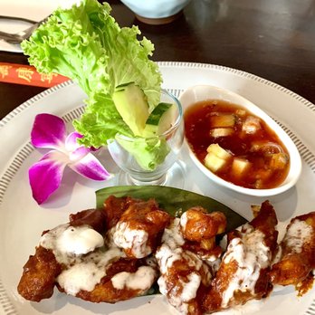 Secret Savory - Appetizers Kor -Lae chicken is grilled chicken marinated in a mild southern style curry served with chili sauce. $11 4* - Thai Near Me - Seattle, Washington Secret Savory - Appetizers Kor -Lae chicken is grilled chicken marinated in a mild southern style curry served with chili sauce. $11 4* - Thai Near Me - Seattle, Washington