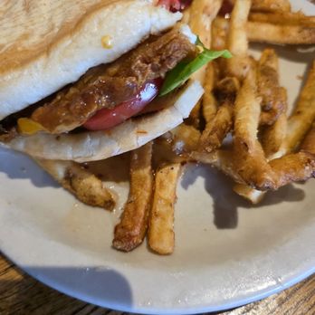 Dick's Pub & Restaurant - A yummy Mother Clucker chicken sandwich. - New American Near Me - Las Vegas, New Mexico Dick's Pub & Restaurant - A yummy Mother Clucker chicken sandwich. - New American Near Me - Las Vegas, New Mexico