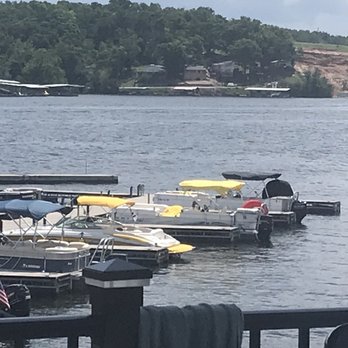 Aqua Toys - Our pontoon boat at the end of the dock (thankfully Dog Days helped us park! Phew!) - Boating Near Me - Osage Beach, Missouri