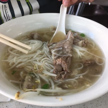 Thai Son Restaurant - Large pho with beef briskets and meatballs ($8.50 + tax). This picture was taken mid-meal. - Vietnamese Near Me - Vancouver, British Columbia Thai Son Restaurant - Large pho with beef briskets and meatballs ($8.50 + tax). This picture was taken mid-meal. - Vietnamese Near Me - Vancouver, British Columbia