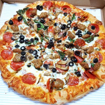 Marco's Pizza - Deluxe pizza, substituted green peppers and onions with olives and spinach. Pretty average tasting pizza. - Pizza Near Me - Jacksonville, Florida Marco's Pizza - Deluxe pizza, substituted green peppers and onions with olives and spinach. Pretty average tasting pizza. - Pizza Near Me - Jacksonville, Florida