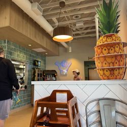 Hawaiian Bros - Sitting at table facing front entrance